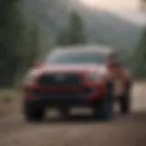 Front view showcasing the bold grille and LED headlights of the 2018 Toyota Tacoma 2WD.