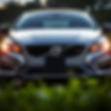 Front view of the 2012 Volvo S60 T6 R-Design showcasing its sleek grille and headlights