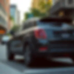 Sleek profile of the Black Fiat 500X parked in an urban setting