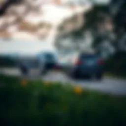 Compact SUV towing a trailer through scenic landscape