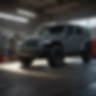 A Jeep vehicle being serviced in a garage