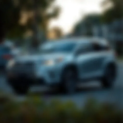 A pristine used Toyota Highlander parked in a Columbus neighborhood