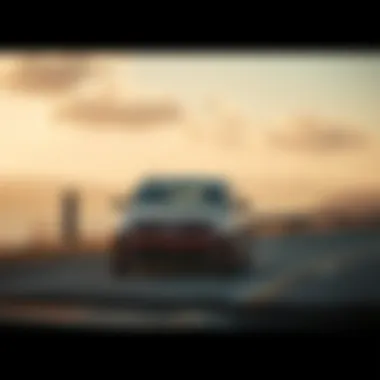 Performance on the Road: Kia Station Wagon in Action Kia station wagon driving on a scenic road