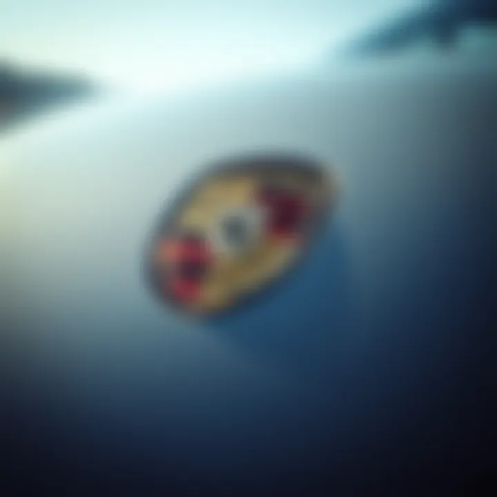 Porsche Emblem and Utah Landscape A close-up of a Porsche emblem reflecting the beauty of the Utah landscape