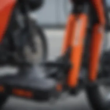 Close-up of safety features on a hitch mounted moped carrier