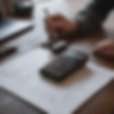 A calculator and car keys on a table