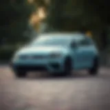 A pristine Volkswagen Golf parked in a serene environment
