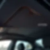 Interior view of VW Golf with worn headliner