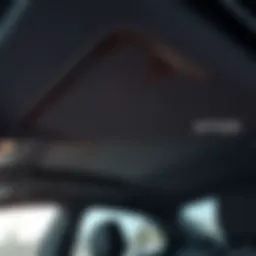 Interior view of VW Golf with worn headliner